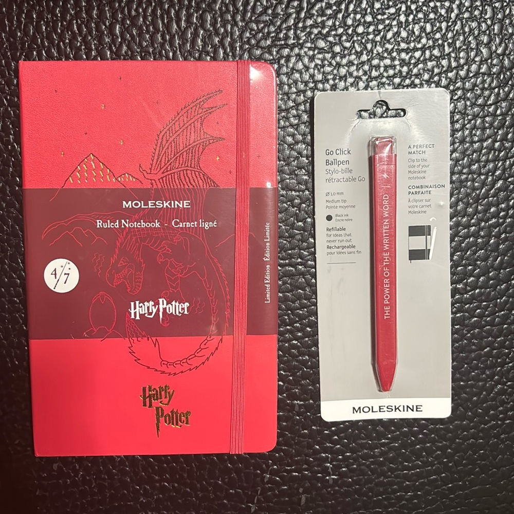 Moleskine Harry Potter notebook and pen.